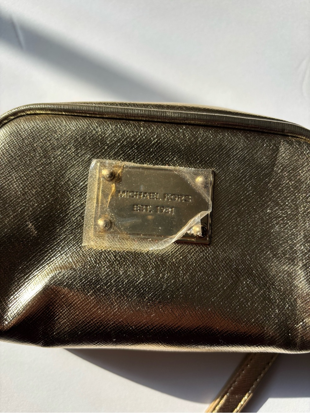 Michael Kors Gold cosmetic bag/wristlet